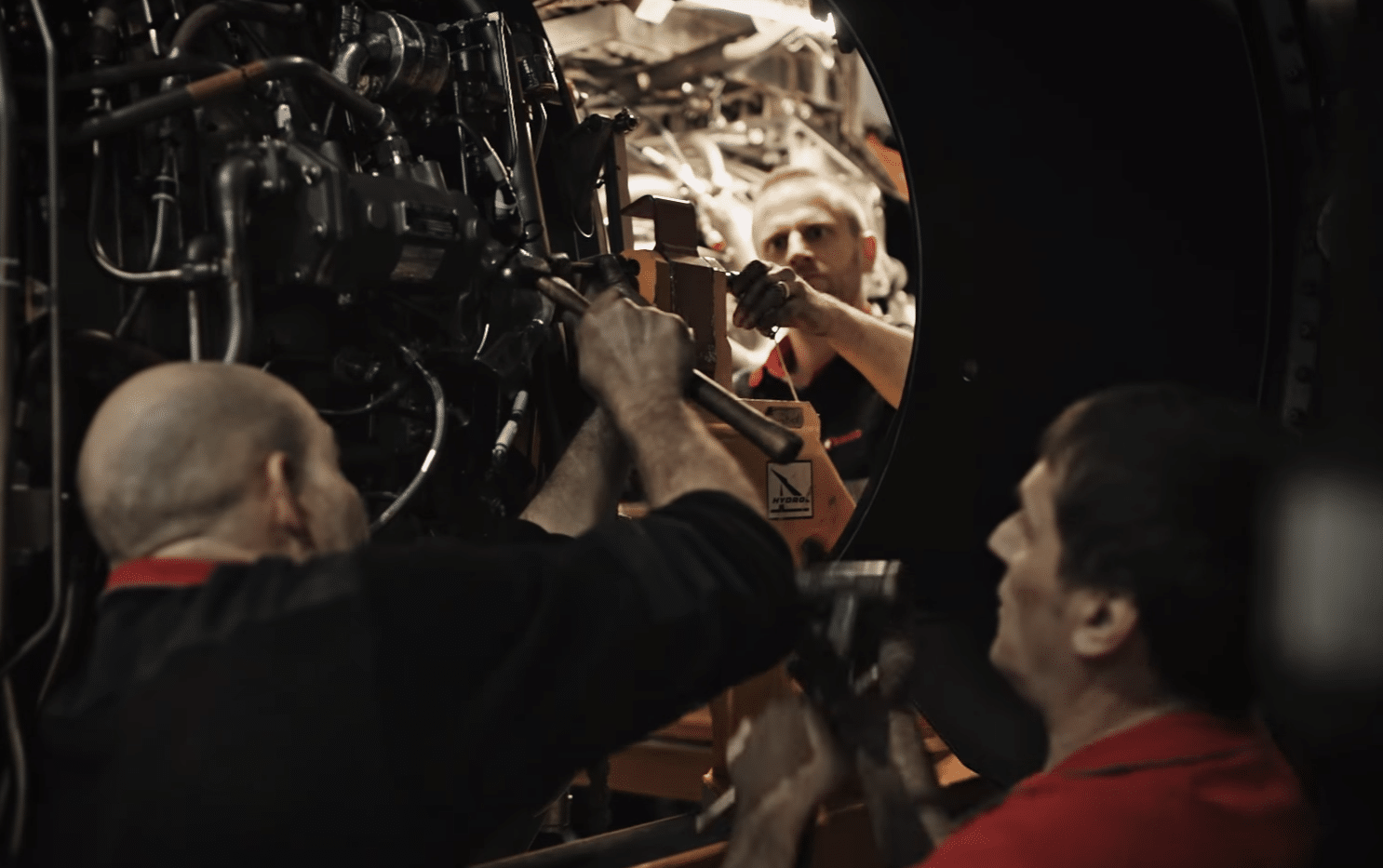 technicians in engine